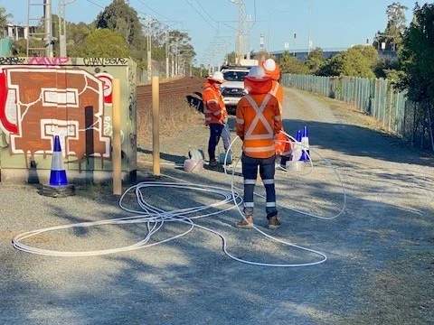 Crew working within a protected rail corridor worksite